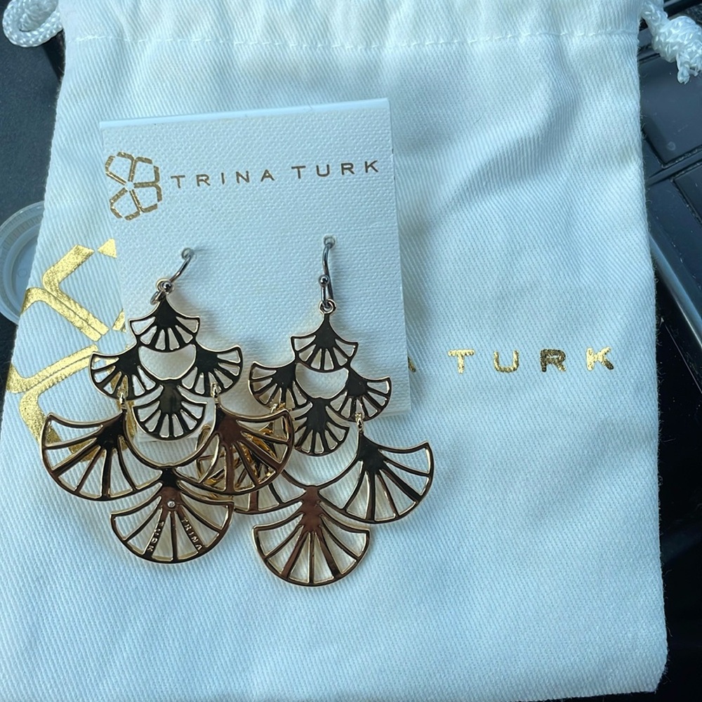 Trina Turk Dangle Gold Tone Earrings. Hook  closure. NEW
